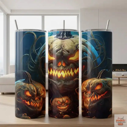 Three Halloween-themed cups with jack-o&