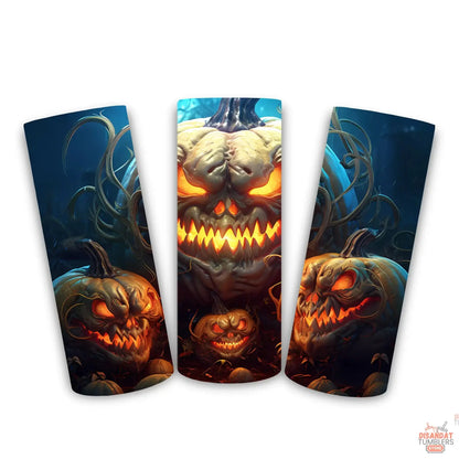 Three pumpkin-themed cups with glowing jack-o&