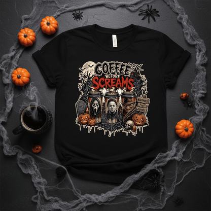 Black Coffee Before Screams Halloween tee flat lay with coffee cup and pumpkins